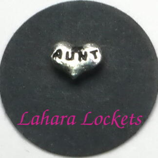 This floating charm is a silver heart that has aunt inscribed on it.