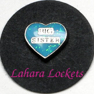 This floating charm is a blue heart that says big sister.