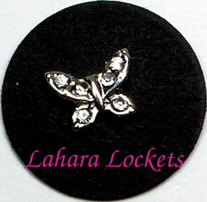 This floating charm is a silver butterfly with clear gems and is compatible with all memory lockets.