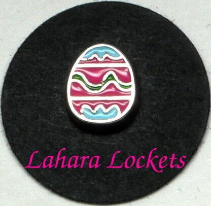 This floating charm is an Easter eg with green, pink and blue stripes.
