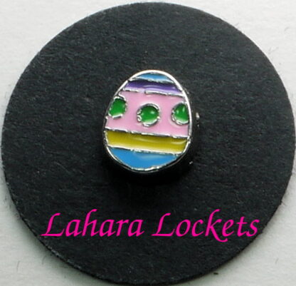 This floating charm is an Easter egg with blue, purple, pink and yellow stripes and green dots.