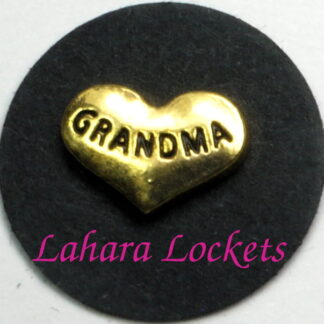 This floating charm is a gold heart inscribed with the word grandma.