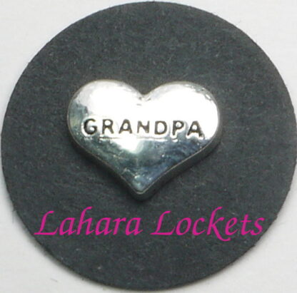 This floating charm is a silver heart inscribed with grandpa.