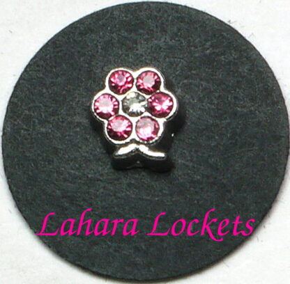 This floating charm is a silver flower with pink, June birthstone gems.