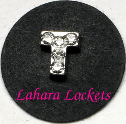 This floating charm is a silver letter T with clear gems.