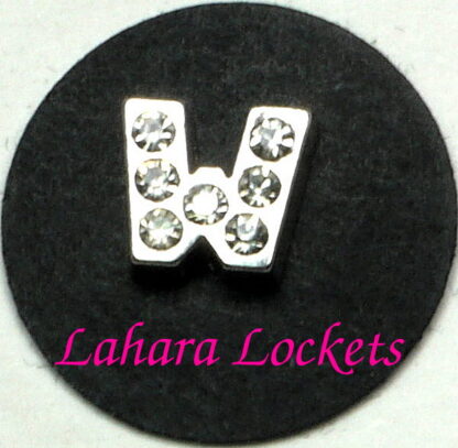 This floating charm is a silver letter W with clear gems.