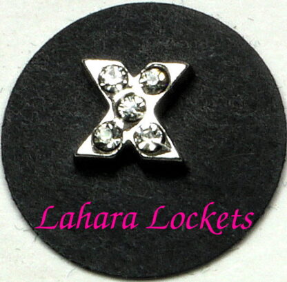 This floating charm is a silver letter X with clear gems.