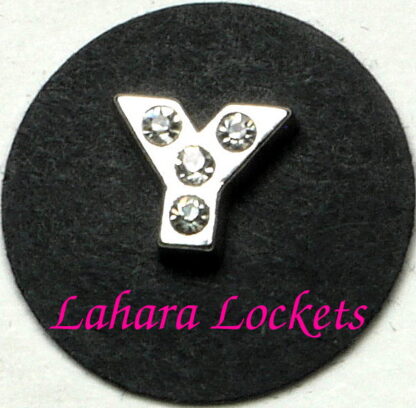 This floating charm is a silver letter Y with clear gems.