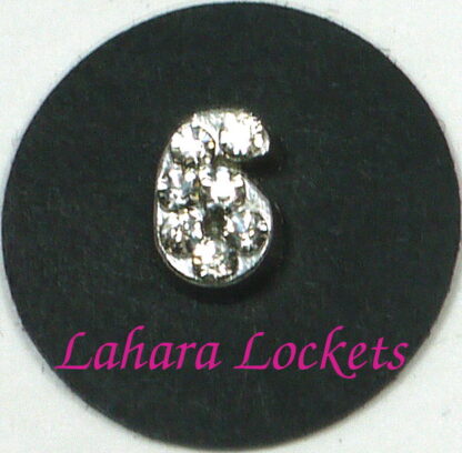 This floating charm is a silver, number six with clear gems.