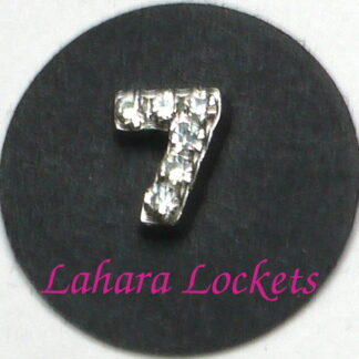 This floating charm is a silver, number seven with clear gems.