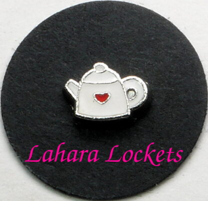 This floating charm is a white teapot with red heart accent.