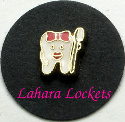 This floating charm is a white tooth with a red bow holding a white toothbrush.