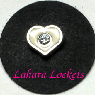 This floating charm is a white heart with a single, clear gem in the center.