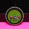 Large round memory locket with two flamingos and house floating charms